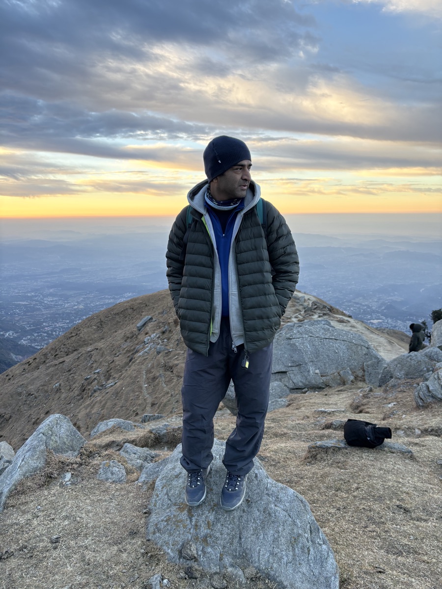 Portrait of Gaurav P standing on the Laka Glacier trail at sunset