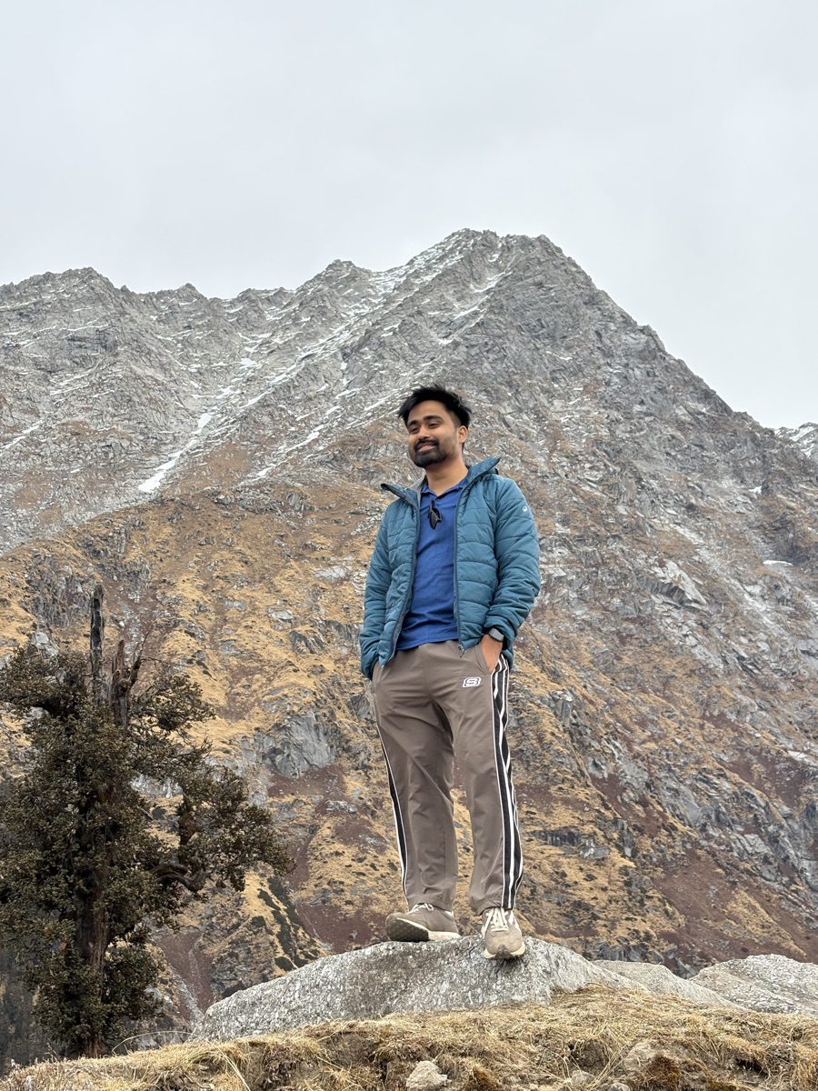 Portrait of Paras standing in front of the mountains on the Laka Glacier trek